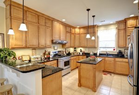 Painting vs staining kitchen cabinets comparison
